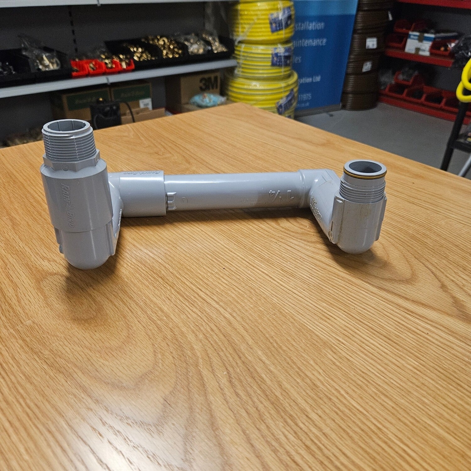 Rain Bird Triple Swing Joint 1 1/4" BSP to 1 1/4" ACME extra inlet elbow