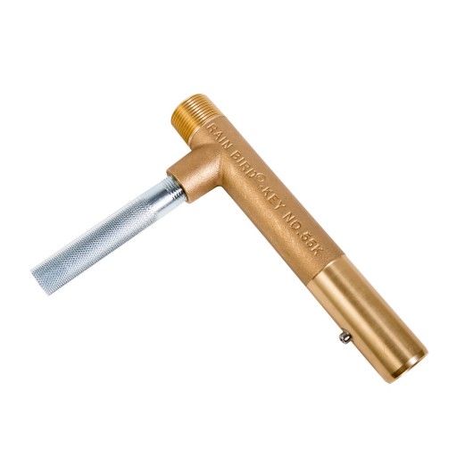 Gold-colored tool with a metallic blade on a white background