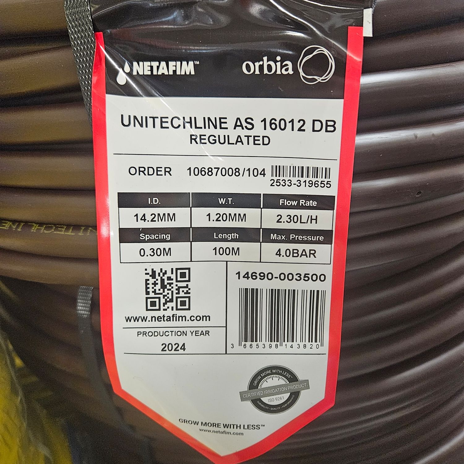 Netafim UniTechline AS 16 mm 2.3 l/h product label showing 30 cm spacing and 100 m coil
